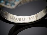 an image of a close up of a ring with a name engraved on it