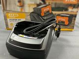 an image of a black and decker battery charger with a box