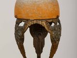 a statue of a man with a helmet on it ' s head