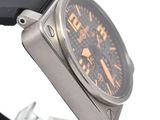 a close up of a wrist watch with a black strap