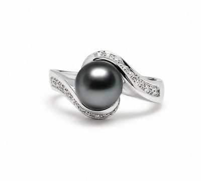 a black pearl and diamond ring on a white background