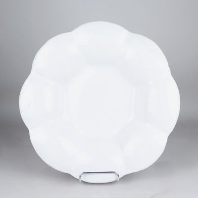 an image of a white plate sitting on top of a table