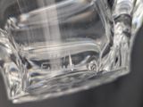 a glass of water that is sitting on a table