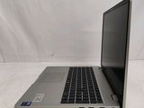 an open laptop computer sitting on top of a white table
