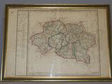 an old map of the county of somerset in a gold frame