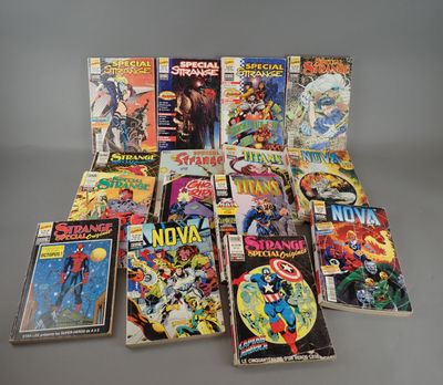 many comic books are stacked on top of each other on a table