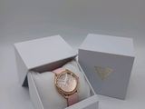 a close up of a box with a watch inside of it