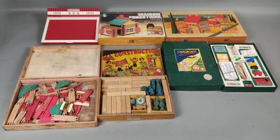 a lot of wooden toys in a box on a table