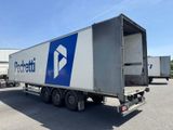 a semi truck that is parked in a parking lot
