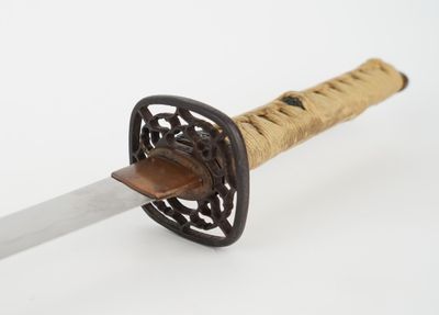 a knife with a handle that is made of wood