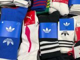 many pairs of socks that are on display in a store