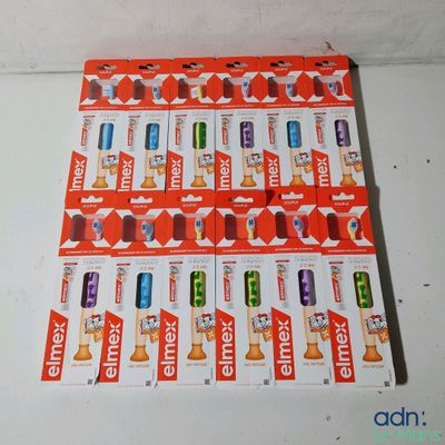 a lot of different flavored candy bars on the table