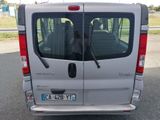 a white van that is parked on the side of the road