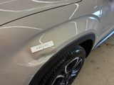 a close up of a car with a sticker on it ' s hood