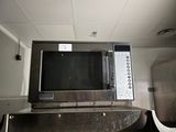 a microwave that is sitting on top of a counter