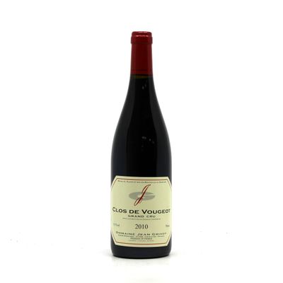 a bottle of wine that is sitting on a table