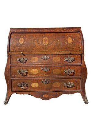 an image of a wooden chest of drawers with ornate carvings
