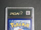 the pokemon game is in a plastic case on a table