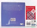 a box with a red and blue plaid tie on it