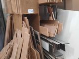 a lot of cardboards stacked on top of each other in a warehouse
