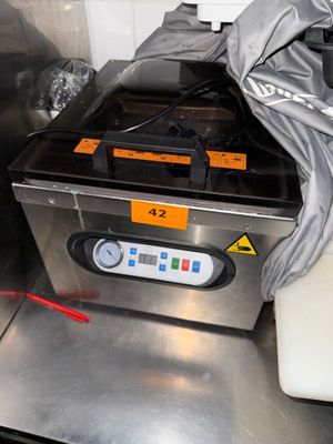 a machine that is sitting on a counter in a kitchen