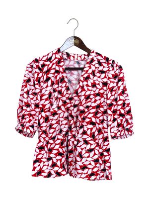 GIVENCHY PARIS Chemisier cache-cœur à motifs blancs et noirs… - Photo 1