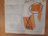 a piece of paper that has a drawing of a box on it