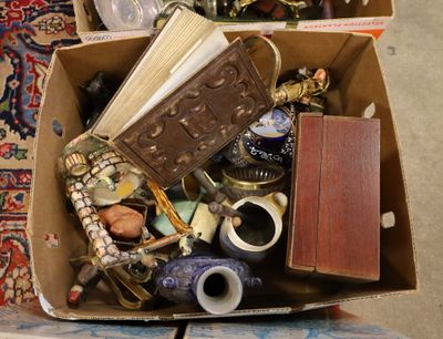 a box full of assorted items sitting on the floor