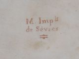 an image of a close up of a plate with writing on it