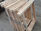 several pieces of wood are stacked on top of each other
