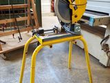 a machine that is sitting on a stand in a garage