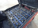 an image of a truck that has a bunch of tools in it