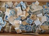 a box full of old postage stamps in it