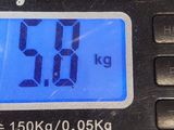 a close up of a digital clock on a counter