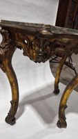 Console en bois doré et sculpté de coquilles, volutes et feu… (photo 3)