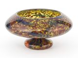 un vase en verre orné d'un motif jaune et marron