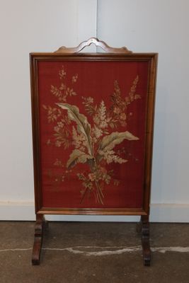a picture of a painting on a stand in a room