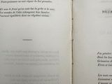 an open book with a picture of a bird sitting on top of it