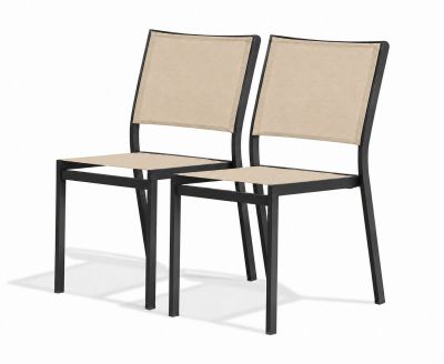 a pair of black and beige chairs on a white background