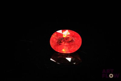 an image of a red diamond on a black surface