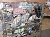 a large metal cage filled with lots of items