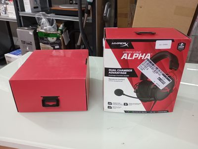 a box of headphones sitting on a table next to a box of headphones