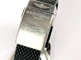 an image of a close up of a watch on a white surface