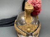 a helmet with a flower on top of it
