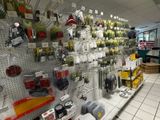 many items on the wall in the store for sale