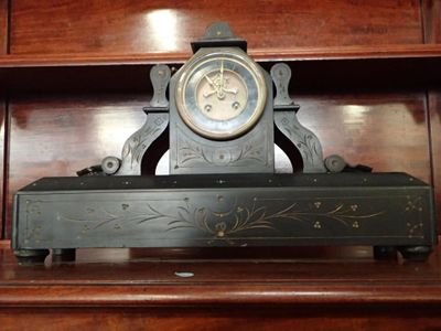 Pendule parisienne squelette, les heures en chiffres romains…