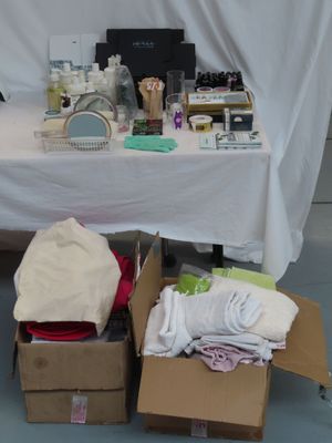 a table with a lot of items on it in a room