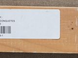 a box with a label on it sitting on the floor