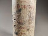 a bottle of wine that has been wrapped in plastic