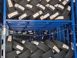 a blue cart filled with lots of black and white items